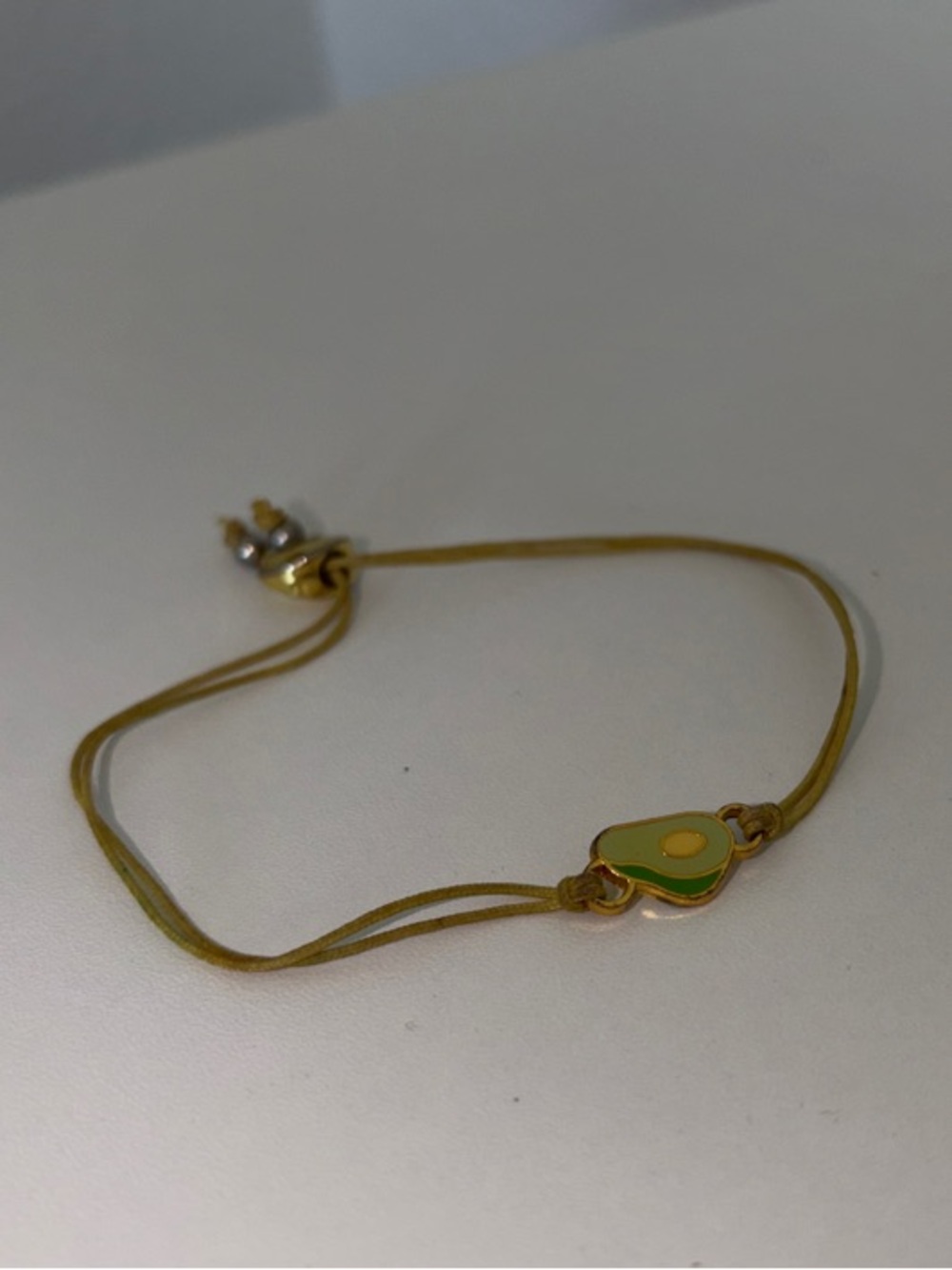 Delicate Gold-Tone Bracelet with Green Enamel Accent